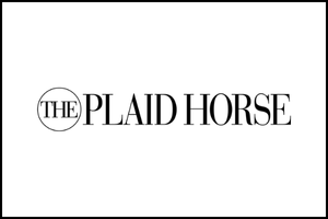 Logo for The Plaid Horse with the word THE inside a circle, followed by PLAID HORSE in bold, uppercase letters on a white background.